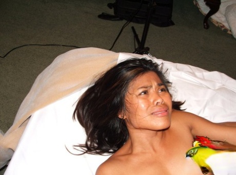 Asian teen Arcadia Davida has sexual intercourse on a bed with a black guy 54660777
